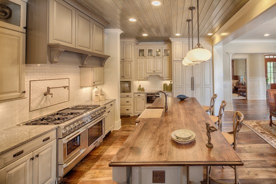 This kitchen incorporates natural tones into the traditional color scheme.&nbsp;Project: Georgetown by Visbeen Architects, Inc.&nbsp;