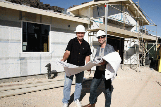HomeAid
Southern Nevada President Rocky Cochran and Arash Ghafoori, executive director
of the&nbsp;Nevada
Partnership for Homeless Youth, confer over plans for an expansion of a teen drop-in Center in Las Vegas. The project, completed earlier this year, was led by a team from Pardee Homes.&nbsp;