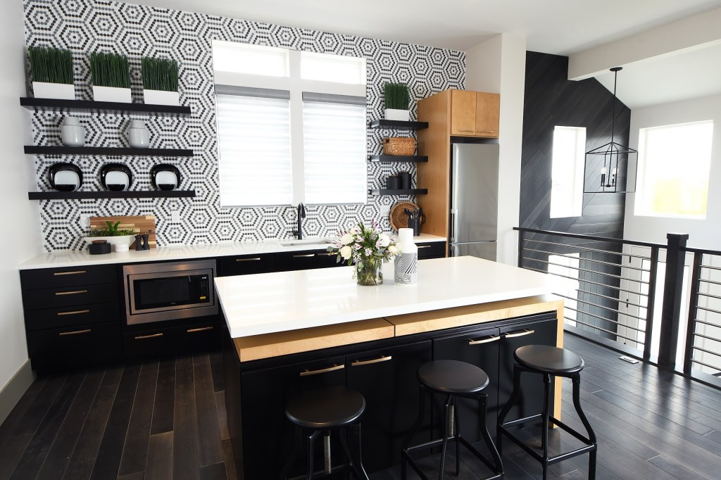 The second floor suite has a kitchenette for the flexibility to have separate living quarters for a renter, a caregiver, or an adult child.