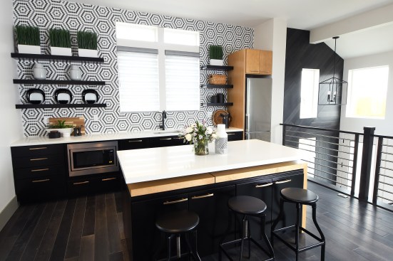 The second floor suite has a kitchenette for the flexibility to have separate living quarters for a renter, a caregiver, or an adult child.
