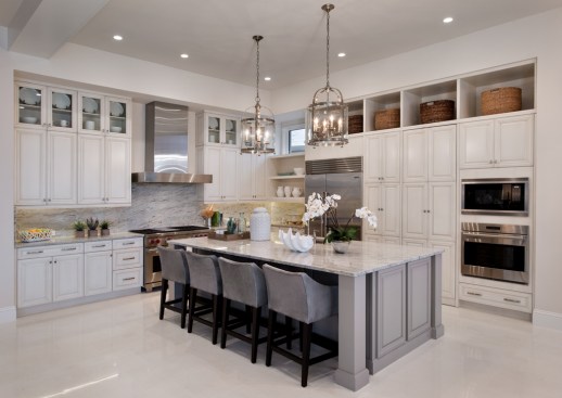 High-end kitchens are a sought-after feature from buyers. Designers at Marc-Michaels use a contemporary palette of neutrals and mixed finishes for visual interest.