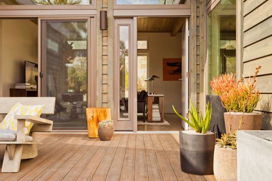 Multiple sliding glass doors provide access to the&nbsp;courtyard.
