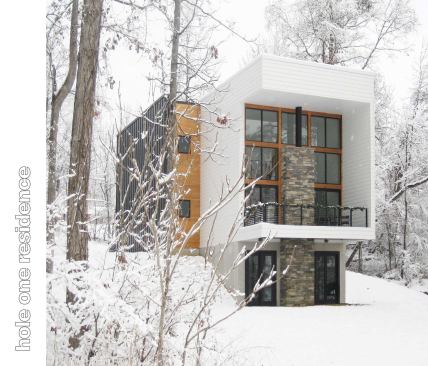 Public Voting Winners - First Place:  Hole One House, Clemmons, N.C.  Designer: Adam Sebastian  Builders: Ken McDaniel & Adam Sebastian  Designer’s description:  Located in the Yadkin River Valley near Clemmons, N.C., Hole One House features a passive solar design and is just 20 feet wide by 67 feet long.&nbsp; Designed to be as hyper-efficient as the budget would allow—$85 per square foot—the home features 2x6 and 2x8 wall construction, precast concrete basement/foundation walls, and spray foam insulation, in addition to highly efficient windows, appliances, and mechanical systems. The strong backward C-shaped form that the front of the home projects is intentional and serves several functions: to mitigate the summer sun (roof), to shield the arrant golf ball from hitting south-facing windows (wall), and to create a cantilevered balcony on the exterior (floor).