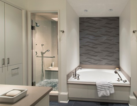Light tones are paired with a patterned backsplash for a sophisticated color scheme.&nbsp;Project: A Move to the City by Muse Architects&nbsp;