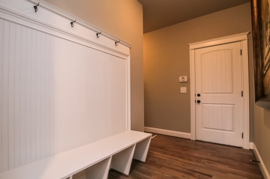 No
need to go through the laundry room when entering from the garage: it’s been
moved to the side, making way for a spacious mud room that offers outstanding
organization for coats, backpacks, and such.
