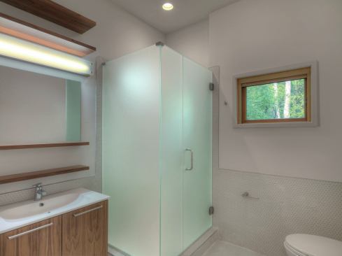 Hot water is supplied by a Rinnai on-demand hot water heater with compact distribution and a central manifold. 

