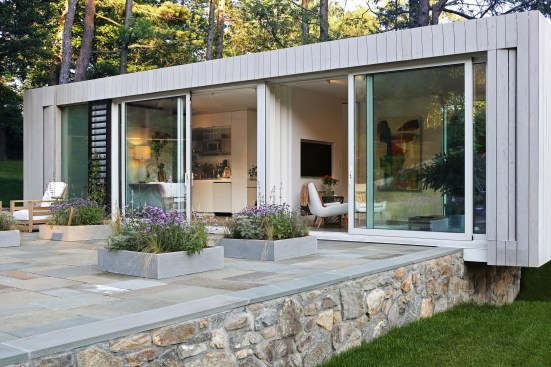 The retreat serves as an office, poolhouse, studio, and entertainment space