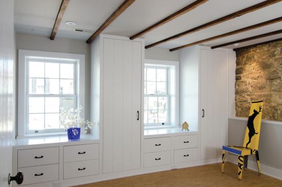 In order to uncover old floor joists, the team had to put the ceiling between existing beams and floors with just enough space for low-cavity lights, flexible ducts, and insulation. 