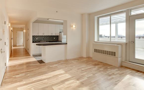 Interior walls contain R-15 Knauf recycled fiberglass insulation. Outside, masonry cavity walls and precast concrete plank construction allowed for about 2&frac14; inches of Dow rigid XPS foam. The building achieved a HERS rating of 41.