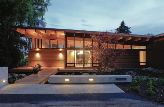 The roof’s upward slope tracks the progression from private to public space.