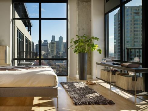 Situated in the heart of Seattle’s Belltown neighborhood, this 12-story, steel and concrete LEED-certified building offers loft units with 10-foot-high ceilings, exposed ductwork, and concrete pillars. Floor-to-ceiling windows allow stunning views of the urban landscape as well as maximum daylight. 
Architect: Mithun, Seattle 
Builder: JE Dunn, Kirkland, Wash.