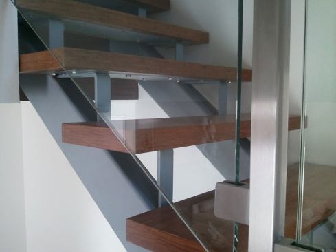 Two-inch stair treads are made of solid carbonized strand bamboo, which continues through the second floor.