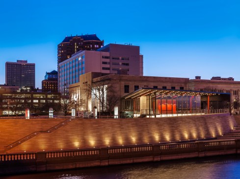 The program includes a public cafe space, public restrooms, and mechanical service spaces. 
