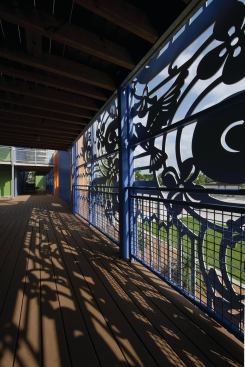 The murals not only provide beauty on the outside, but also on the inside, where they create interesting shadow patterns.