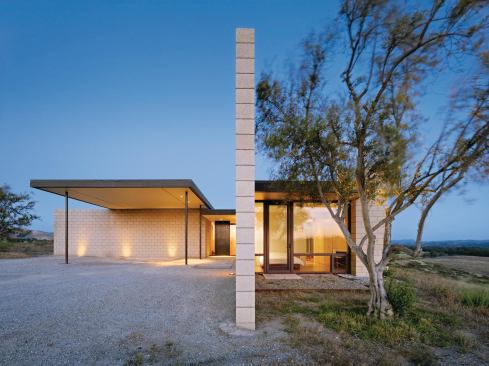 Photovoltaics and a solar hot-water system help save energy, making the most of the project's location in the arid Central Coast wine region of California.