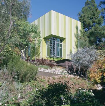 The water reappears in a lily pond seen from a corner window and glass floor. "When you open the window, you hear the sound of cool water," says Aleks Istanbullu. "You get a sense that you're part of the outdoors, but you're not looking through giant wind