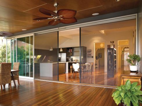 #13 Centor Architectural Retractable Screening System  The S1E retractable screening system combines the company’s insect screen with a privacy blind. For summer days, the blind can be pulled out to block solar heat gain; in winter, it can help retain the home’s heat at night. The shade, made of tightly woven PVC fiberglass mesh, is available in privacy or shade fabrics for varying levels of translucence. The screen and blind slide horizontally along separate tracks; a shock-absorption system prevents the screens from being damaged if a person or pet walk into them. 866.255.0008. 
www.centorarchitectural.com.