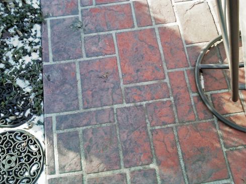 Delaminating sealer peeled the release from this patio’s surface, making it look blotchy.
