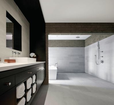 Natural materials like stone and wood add warmth to the sleek design. 