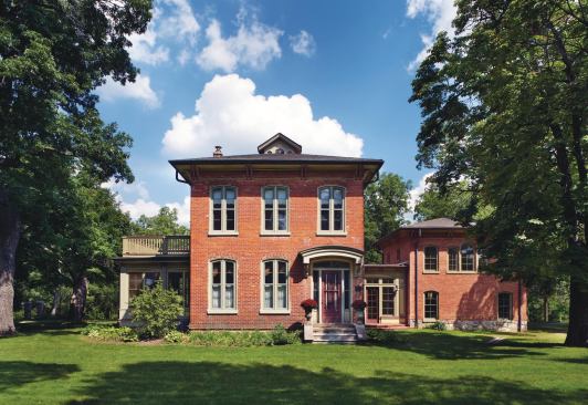 Architect Michael Klement's clients, owners of a landmark 1860s-era Italianate home, have a growing family and wanted more space, an improved entry area, and an attached garage that respected the historic home. 