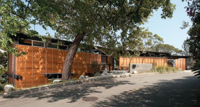 Well-known architects designed this 1956 midcentury house, but the post-and-beam structure had been abandoned. Though the original home was too decayed to save, architect Douglas Ewing designed a contemporary post-and-beam house that maintains more than 10% of the original angled floor plan.
