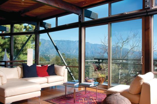 Almost all the rooms in the house have floor-to-ceiling windows with the mountain scenery as a backdrop.