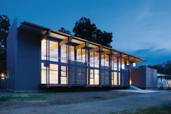 Metal and wood screens provide passive cooling and privacy to Shipley's office.