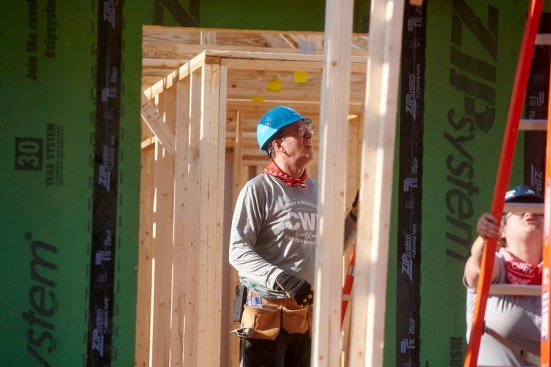 Jonathan Reckford, CEO of Habitat for Humanity International, helps build a home in Charlotte, North Carolina.  Like other builders, the nonprofit is trying to figure out how to build more affordable housing amid rising costs and other challenges, he says.