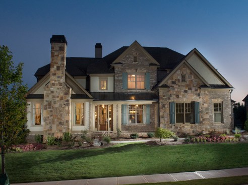 Homes at the builder’s Ruth’s Farm development in Apharetta, Ga., are priced from the $600s to mid-$700s and feature three-car garages. Buyers may add on a third-level retreat or a media, bonus, or sun room in any of six floor plans. Some sites have basements. Shown is the Brentwood model.