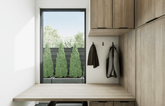 Walking inside from the garage, users can add a mudroom with bench seating, hooks, and storage or an office nook with a built-in desk and cabinetry.