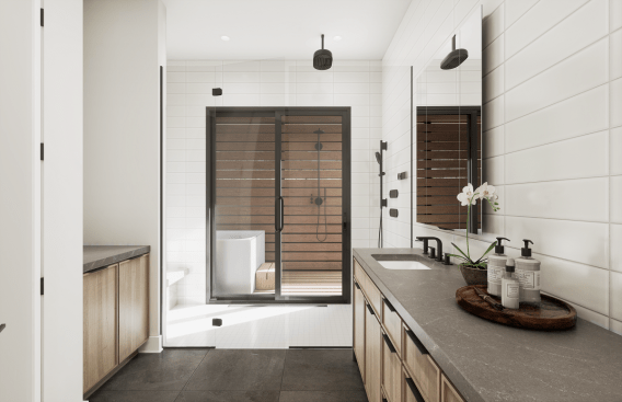 The owner’s suite includes a bathroom with both an indoor and an outdoor shower that are connected via sliding doors.