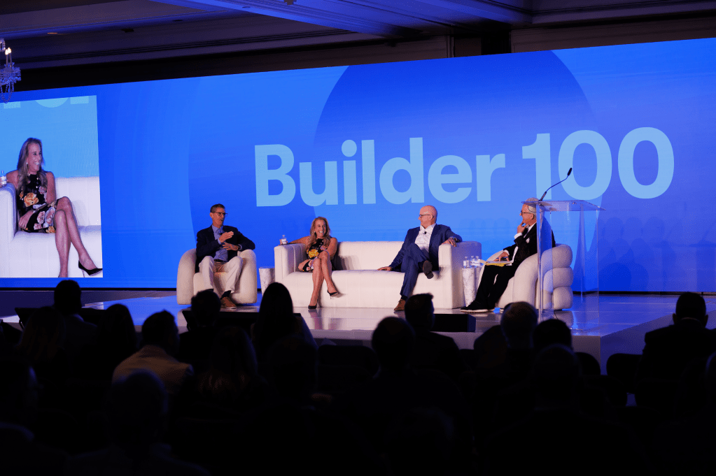 From left, PulteGroup chief operating officer Matt Koart, Taylor Morrison chairman and CEO Sheryl Palmer, and LGI Homes chairman and CEO Eric Lipar speak with Zonda chief advisory officer Tim Sullivan during the "Building Tomorrow Today: Public Builder Leader Spotlight" panel on Day Two of the Builder 100 Conference.